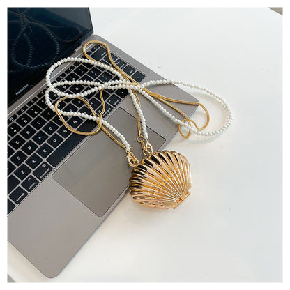 Mini Shell Clutch: Golden